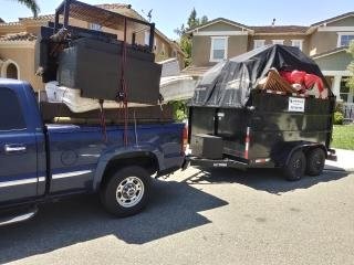Residential junk removal pickup in San Marcos with furniture and household items ready for hauling
