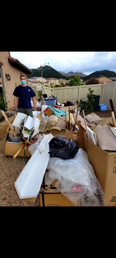 Residential junk removal in Escondido with household debris, furniture, and unwanted items ready for pickup